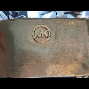 MK gold wristlet
